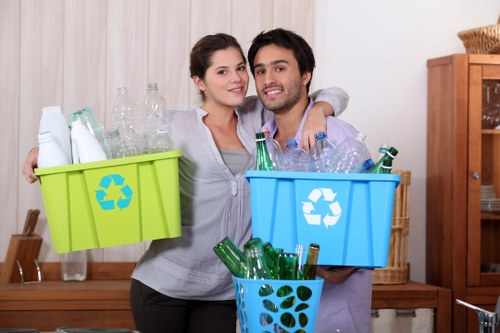 Workers managing recyclable materials on a construction site